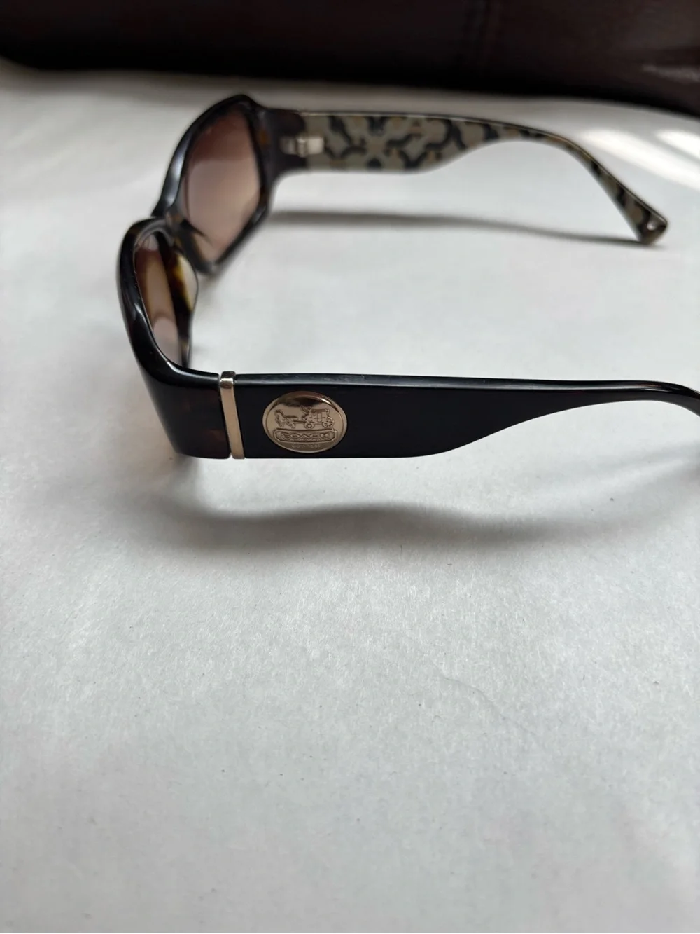 Coach Tortoiseshell Sunglasses with Gold Logo Detail